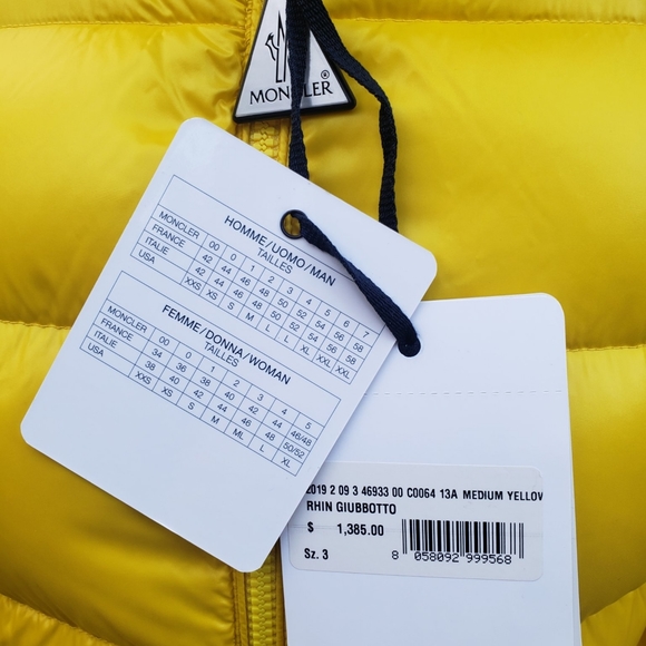 moncler triangle tag